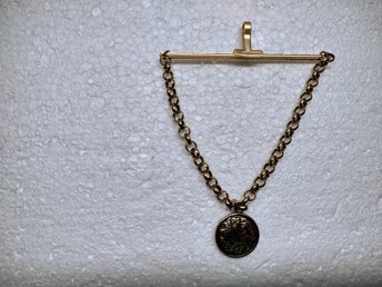 Kalevala Sollejonet slipsnål/ brosch