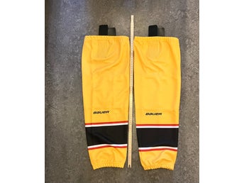 Oanvända Bauer ishockeydamasker gula senior L-XL