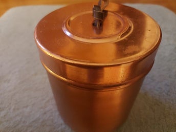 Plåtburk i Koppar Mörkbrunt Skinn som Handtag Höjd 10 cm Diameter 9 cm