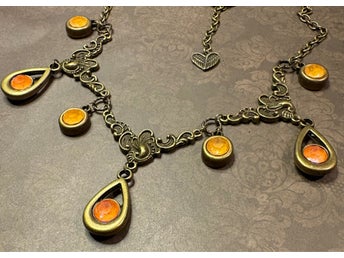 Originellt halsband med gula & orange Swarovskikristaller