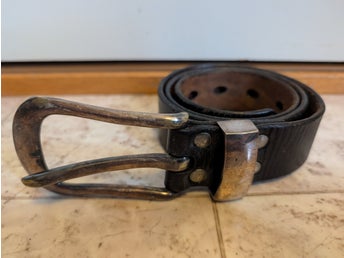Vintage SKINDSMEDEKE svart bä , storlek 80