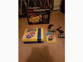 Komplett NES i låda med Super Mario 3 motiv