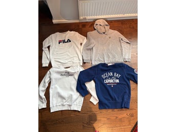 Paket med tröjor från FILA, Peak Performance och Lyle & Scott