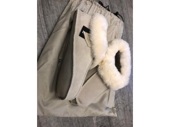 Fårskinnstofflor strl 41 nu 399kr