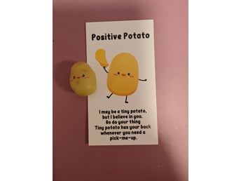 Positiv potatisfigur med kort
