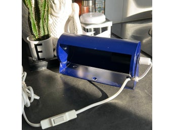 Vägglampa i blå metall IKEA Lod retro sänglampa