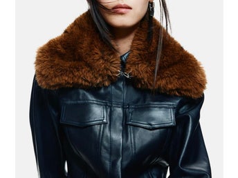 Brun krage i fuskpäls med kedjedetaj från H&M A/W 2025, trend, edition