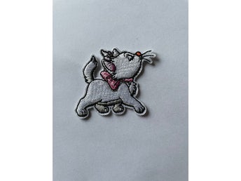 KATT TYGMÄRKE