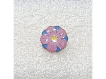 Majblomma pin från 2026