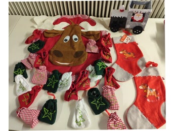 Julkalender älg jultåg julstrumpor juldekorationer